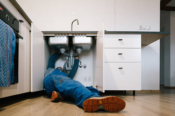Professional Plumbing technician working in Wyoming, DE